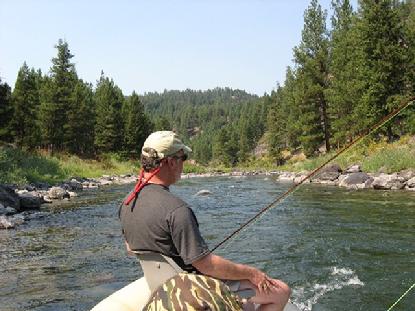 Clarke looks at home, fishin' on the Blackfoot River in Montana.